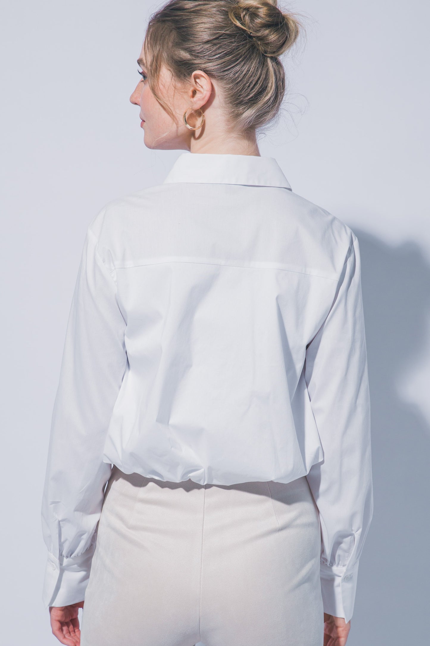 WHITE PEPLUM BLS